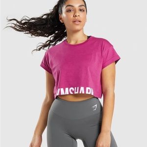 Gymshark fraction crop top hot pink. It looks red in photo.
